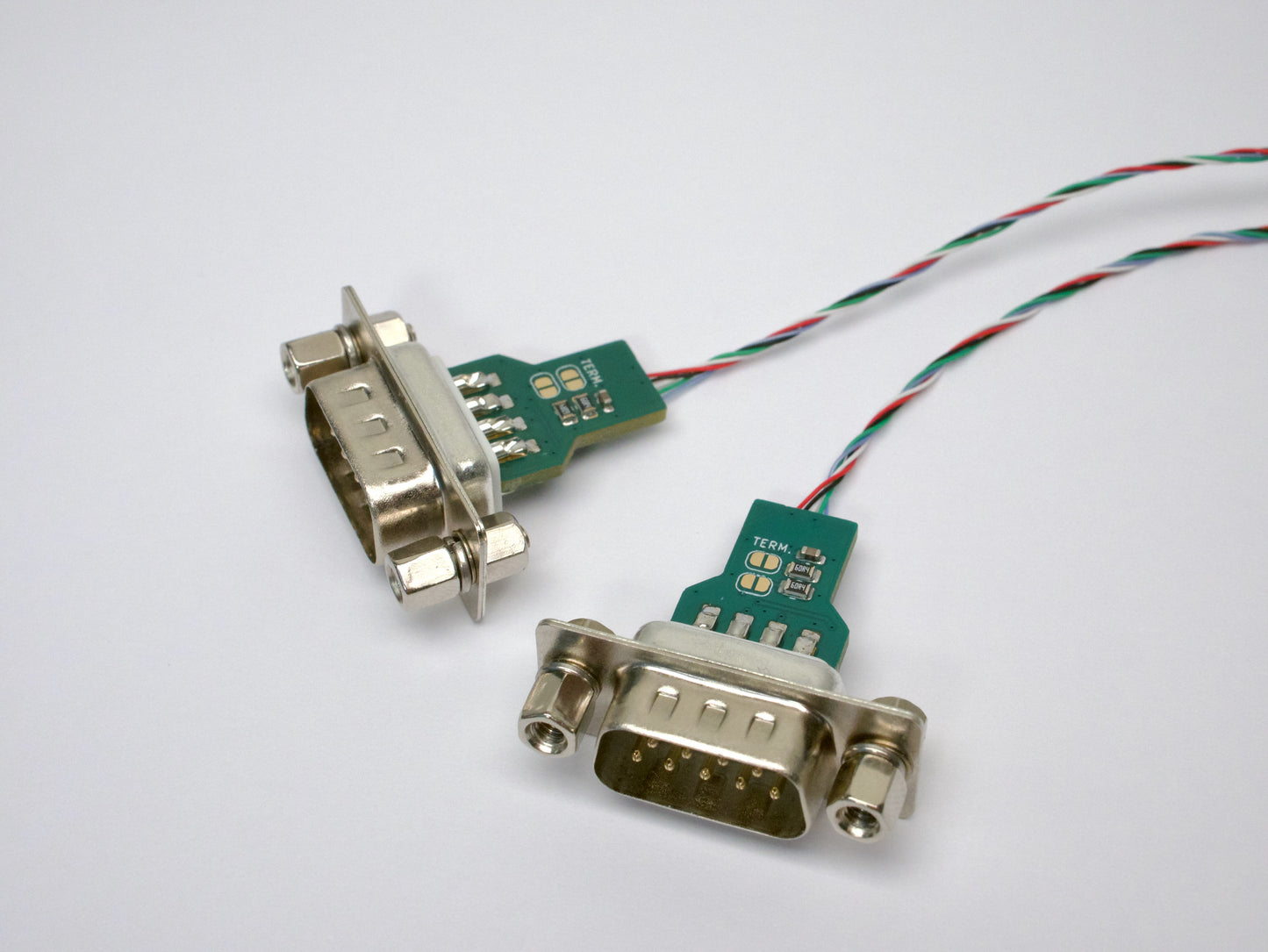 Closeup picture of two DB9 breakout connectors.