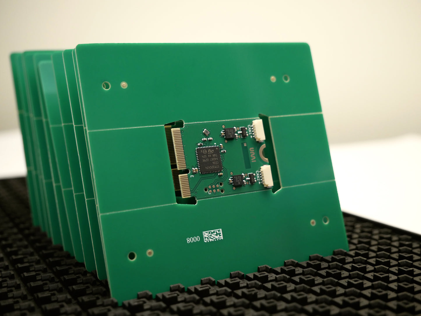 Stack of panelised M.2 CAN FD Adapter cards.